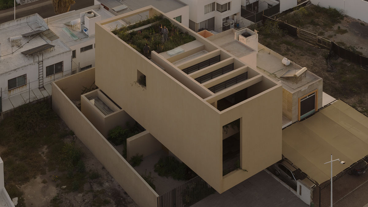 Taller Segovia Molina enriches beige Casa Aguilar with interior patios and an abundance of light