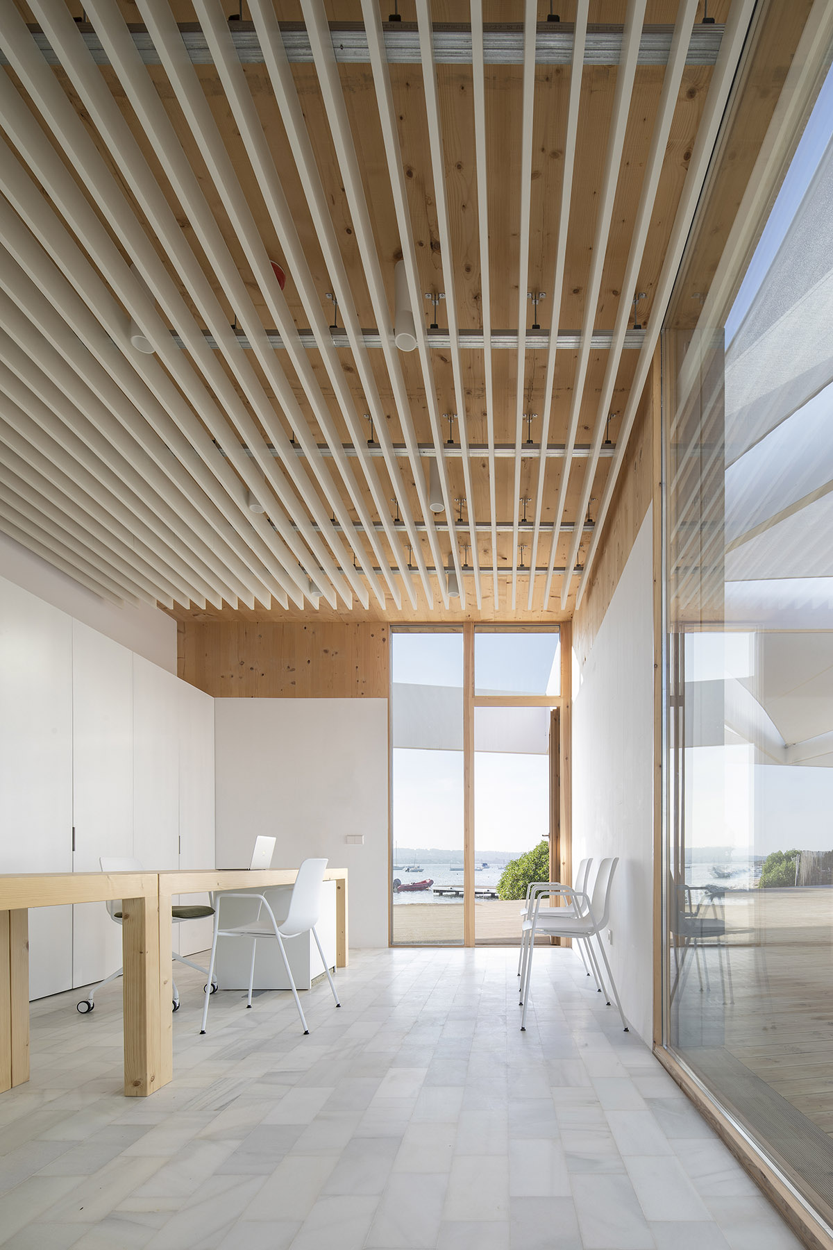 Marià Castelló Architecture completes Water Sports Center with permeable geometry in Formentera