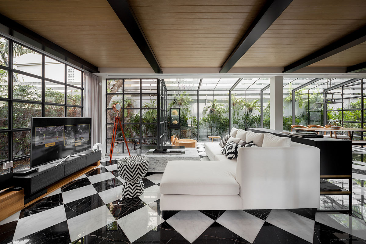 Anonym Studio renovated Bangkok’s old house with steel flower beds to create more openness