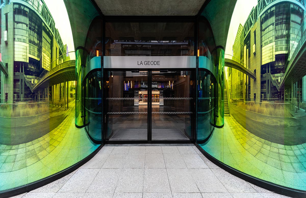 Loci Anima gives a new soul to 1985s hemispherical cinema with dichroic façade in Paris