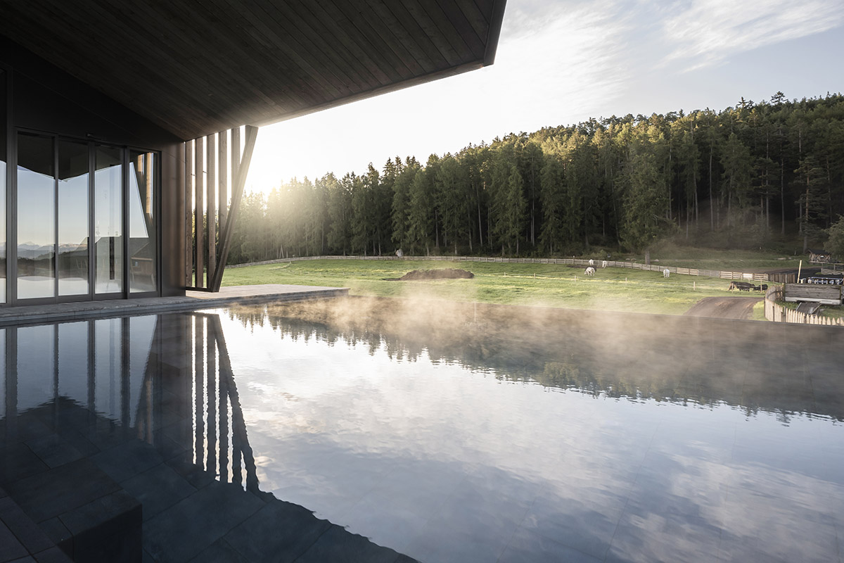 noa* designs boutique hotel and wellness featuring trapezoidal façade in an old farm of Soprabolzano