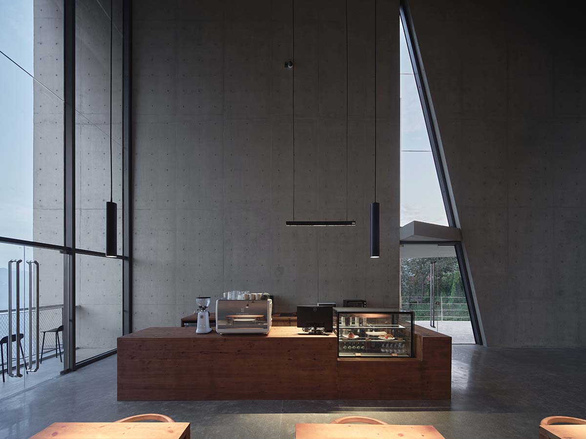 TAO completes concrete bookstore with protruding structure on a steep slope in China 