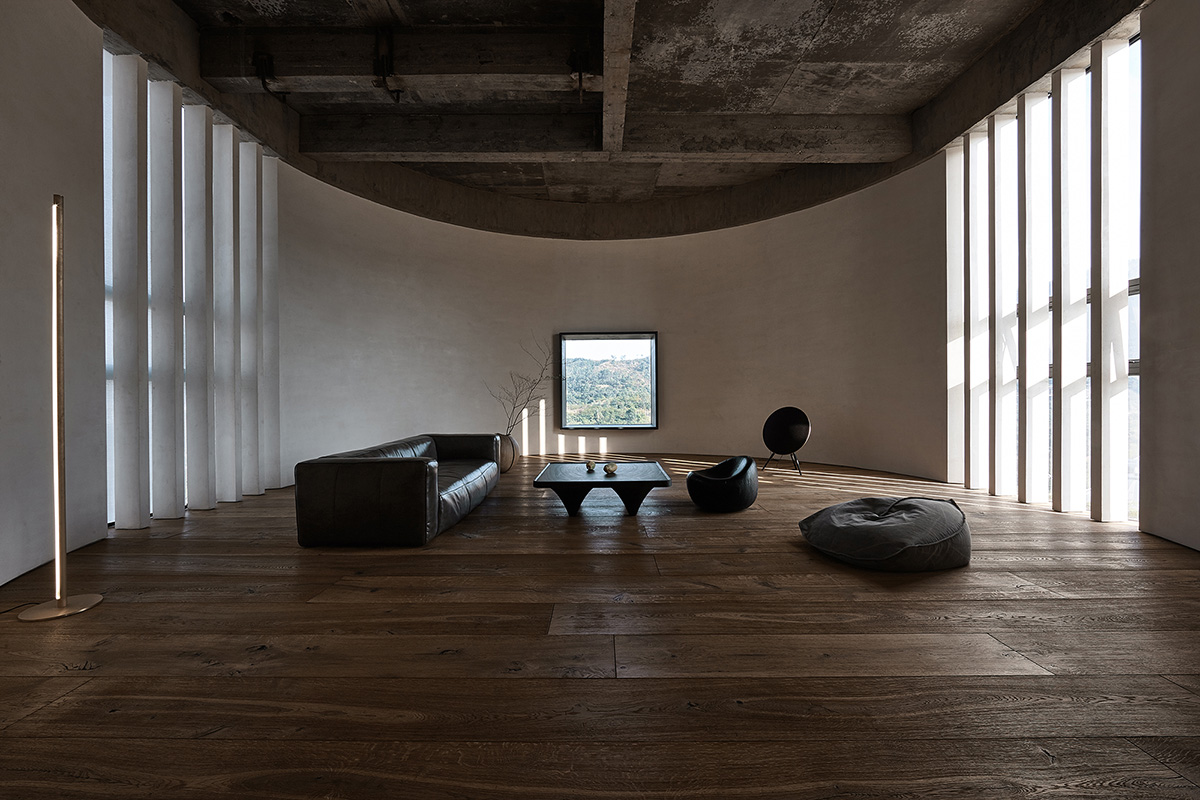 ZMY Design creates earth-toned interiors for a woodwork enthusiast’s house in Fujian, China