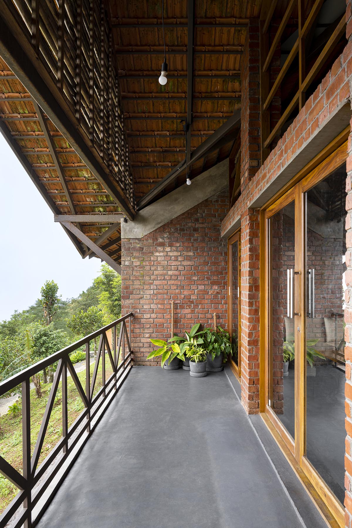 Srijit Srinivas - ARCHITECTS completes resort with dispersed villas in the hills of Idukki, India