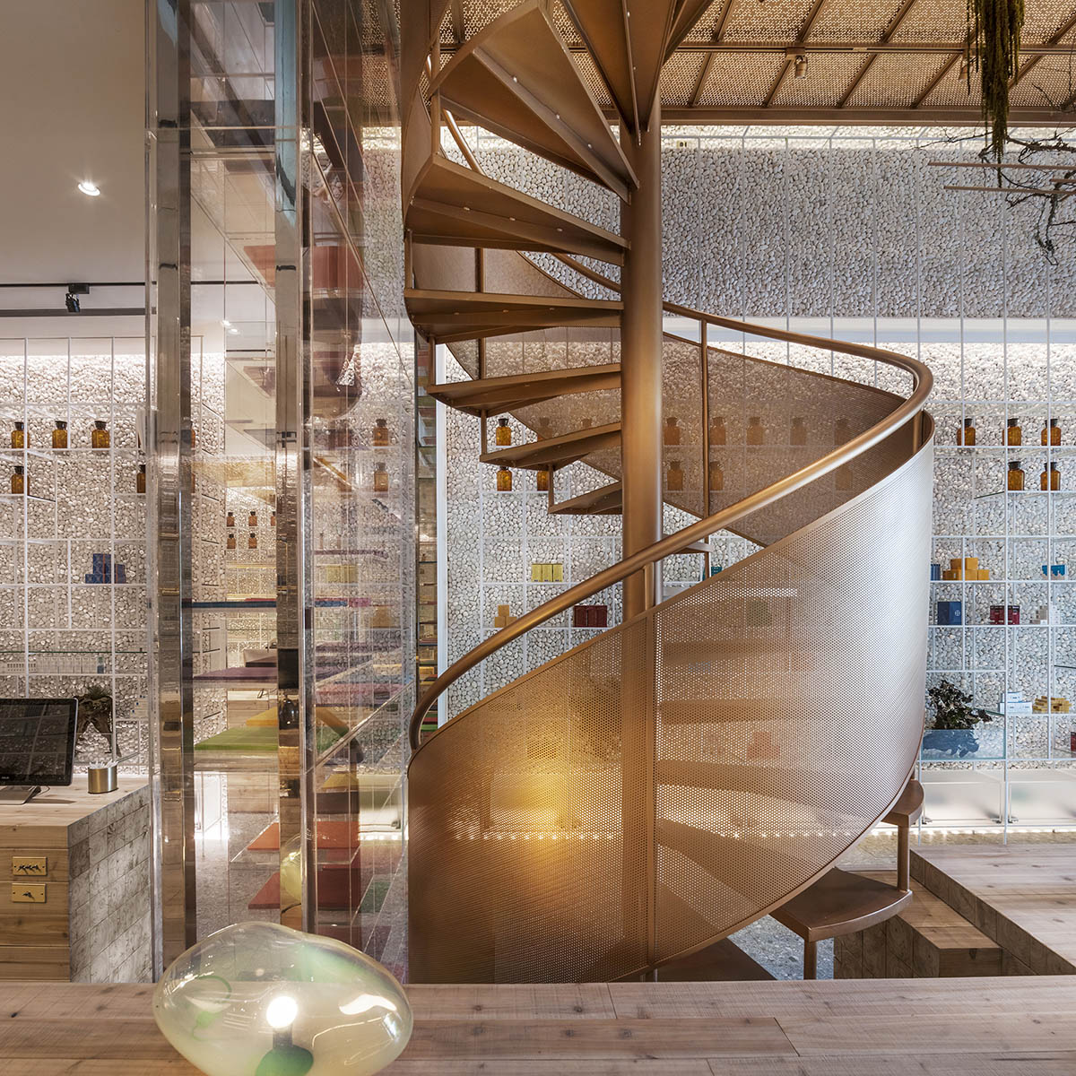 This pharmacy features varied spaces to experience different curing processes in artful environment