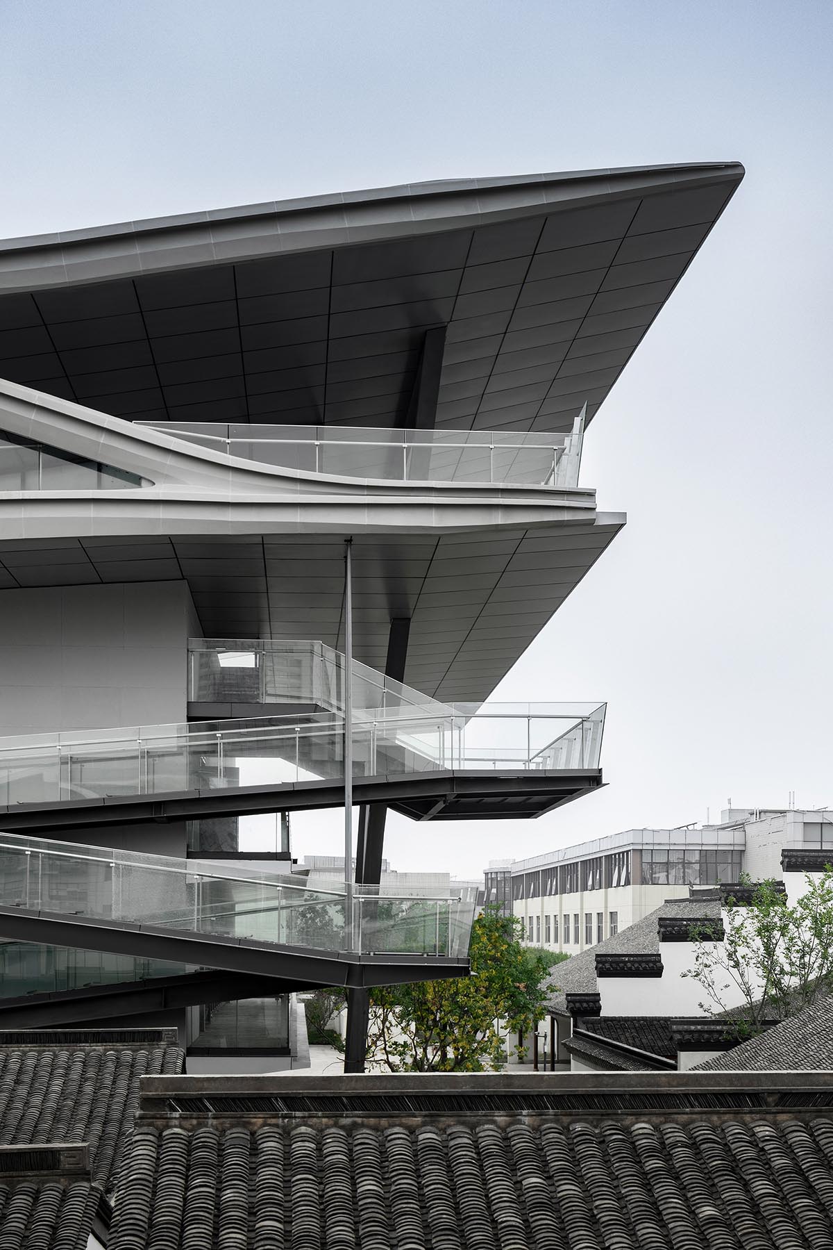 SpActrum completes cultural building with floating terraces and skywalks in Zhejiang, China 