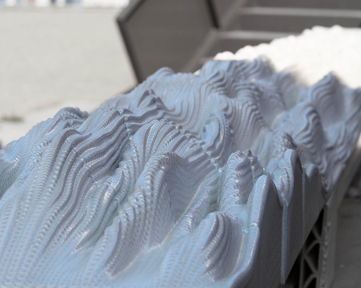 Studio RAP creates façade featuring bespoke 3D-printed ceramic tiles and bricks