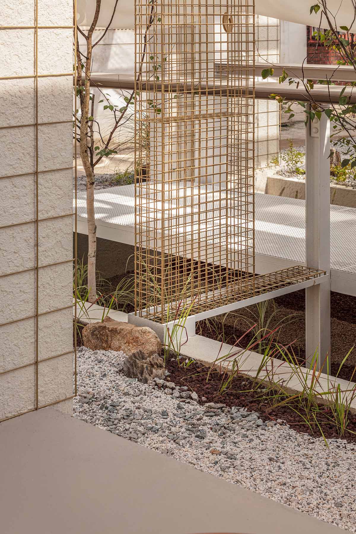 one-aftr converts old factory buildings into a fragmented cafe in South Korea