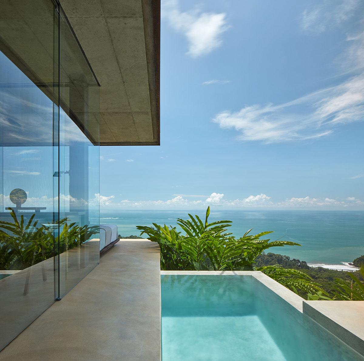 Twin rammed earth villas feature 