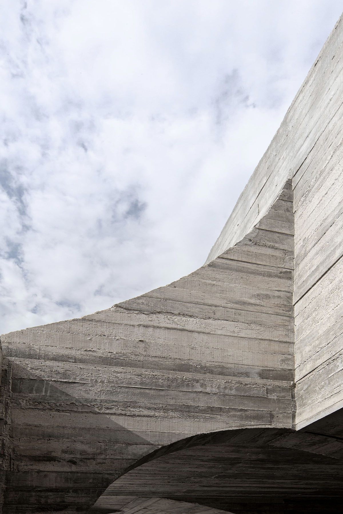 French Kitsch III is a cathedral-like cafe in Thailand that features imperfect arches