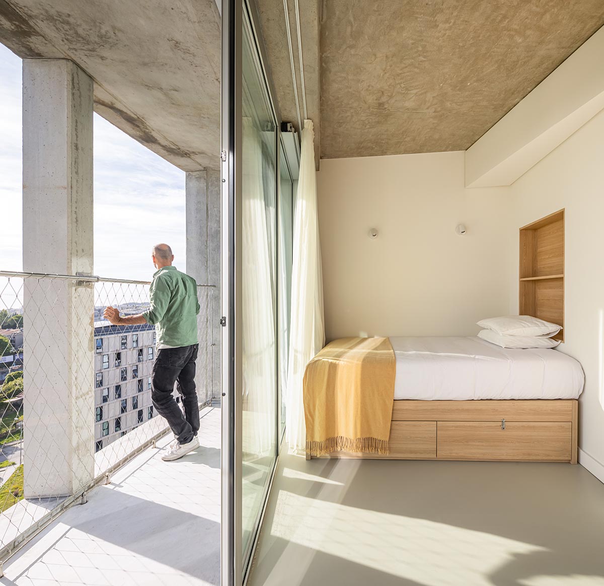 OODA completes cylindrical student housing with colonnaded skin in Porto, Portugal