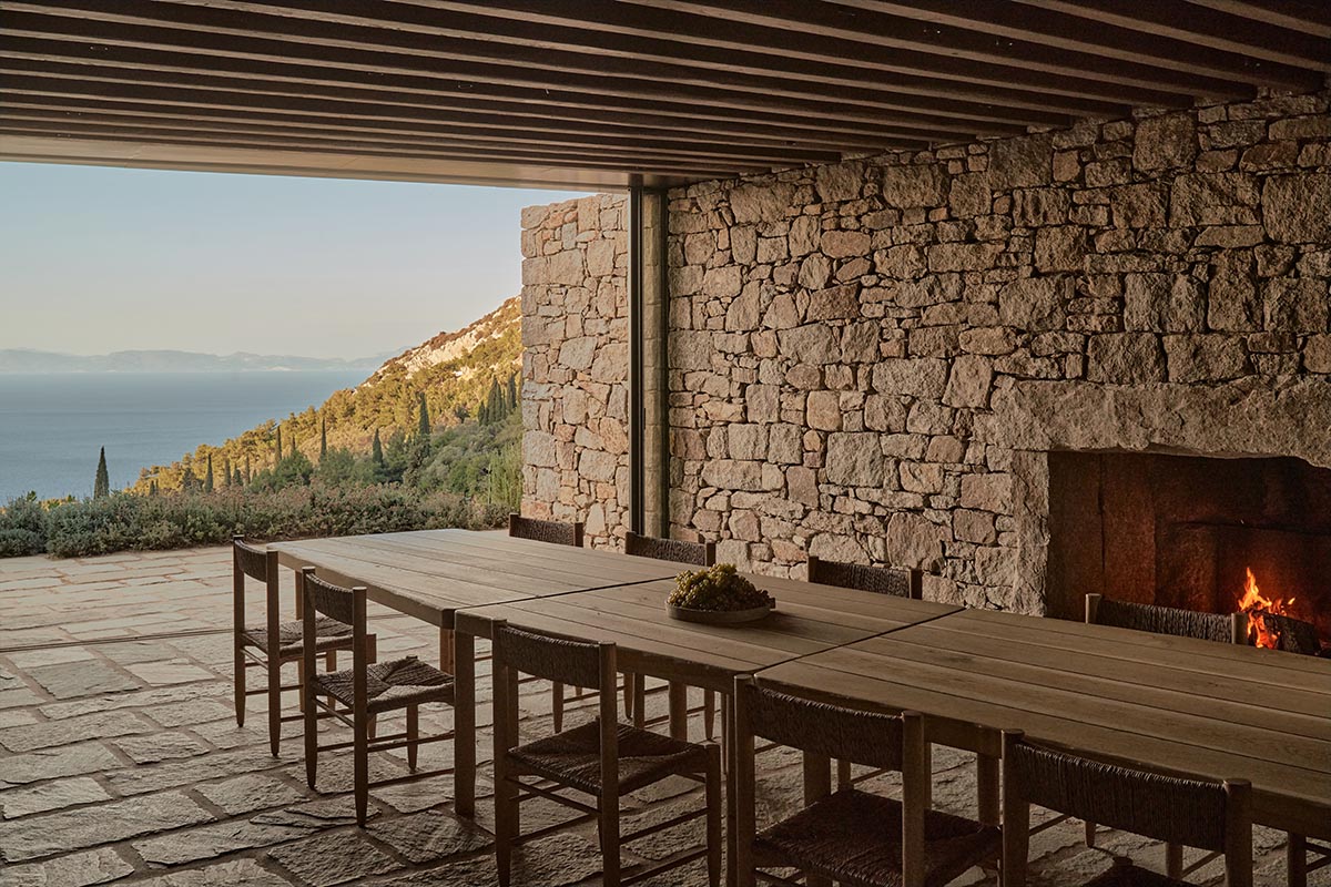 Terraced stonewalls sprawl down to offer an exploratory route in an old vineyard in Samos