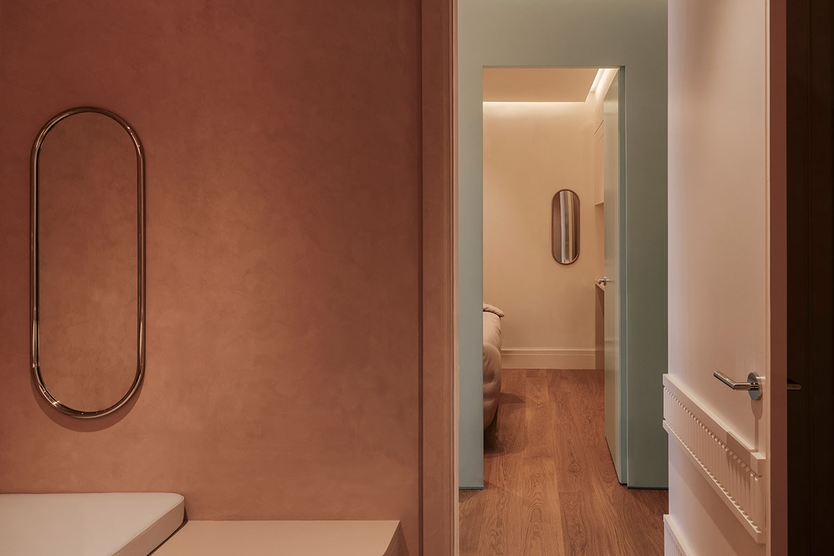 Odami enriches the interiors of a beauty shop with rounded, bevelled details, and pinkish hues