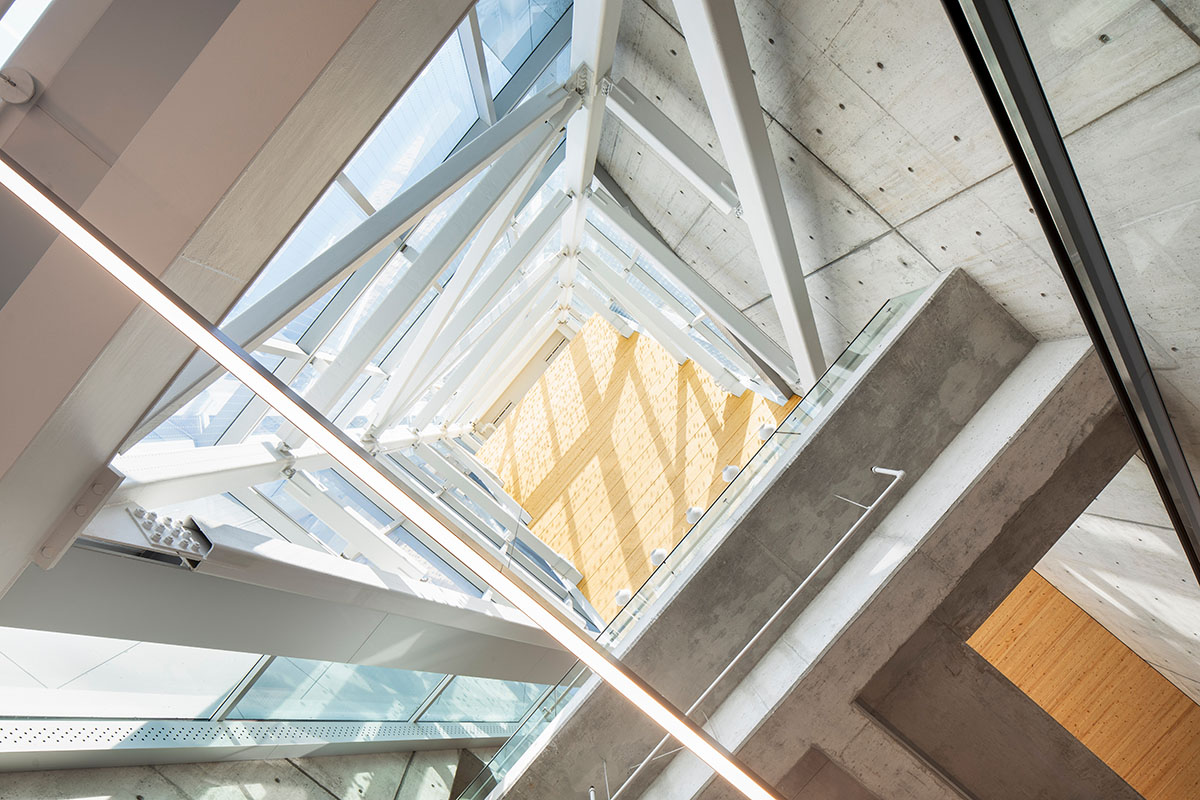 A striking bell tower pierces the sky, illuminating the grandeur of the pavilion in Montreal