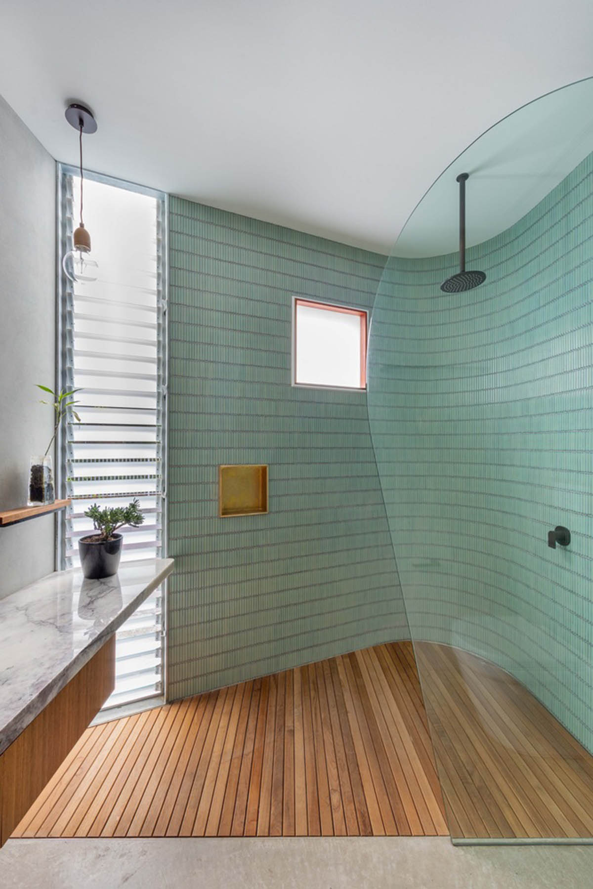 CplusC Architectural Workshop rejuvenates old shop house with blow up green infills in Australia