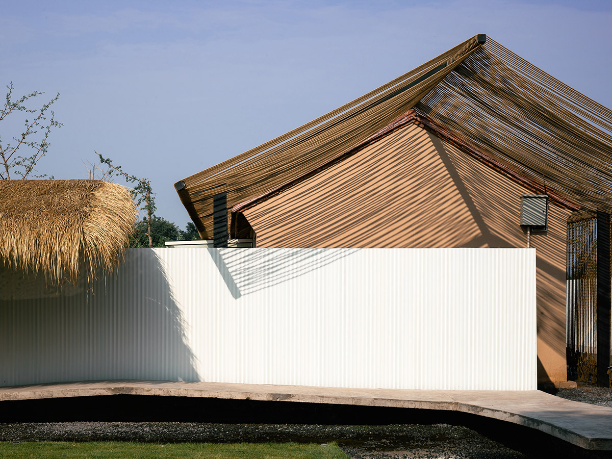 Domain Architects built boutique hotel with thatch roof and 60,000-metre hemp rope in rural Beijing