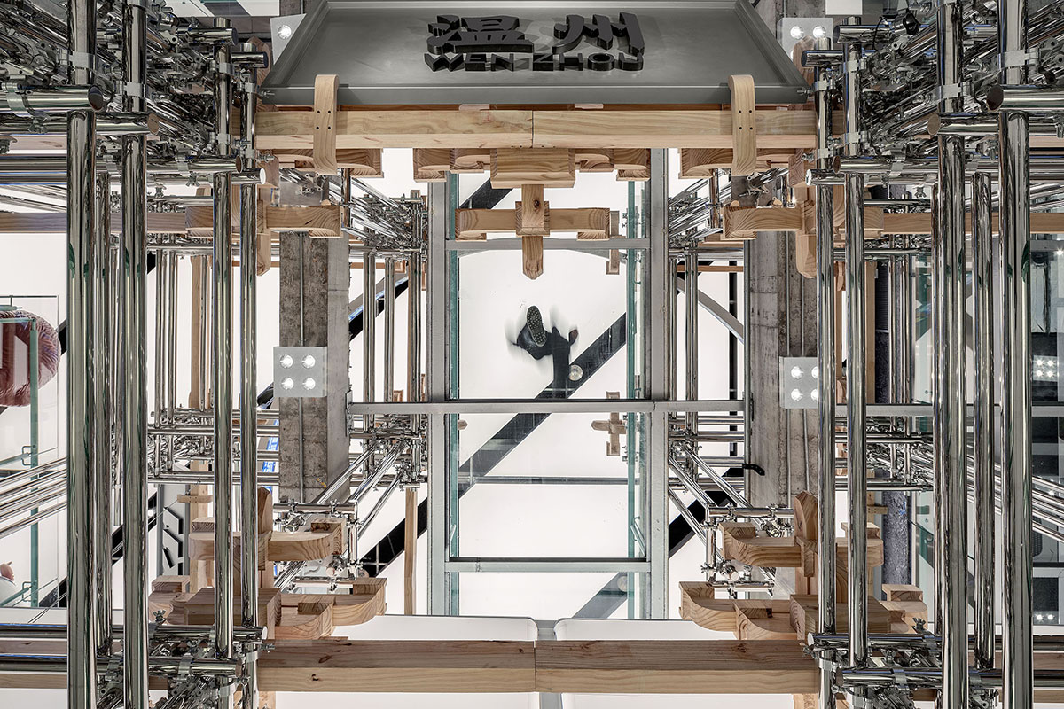 BloomDesign combines stainless steel tubes with timber joints to create retail store in China 