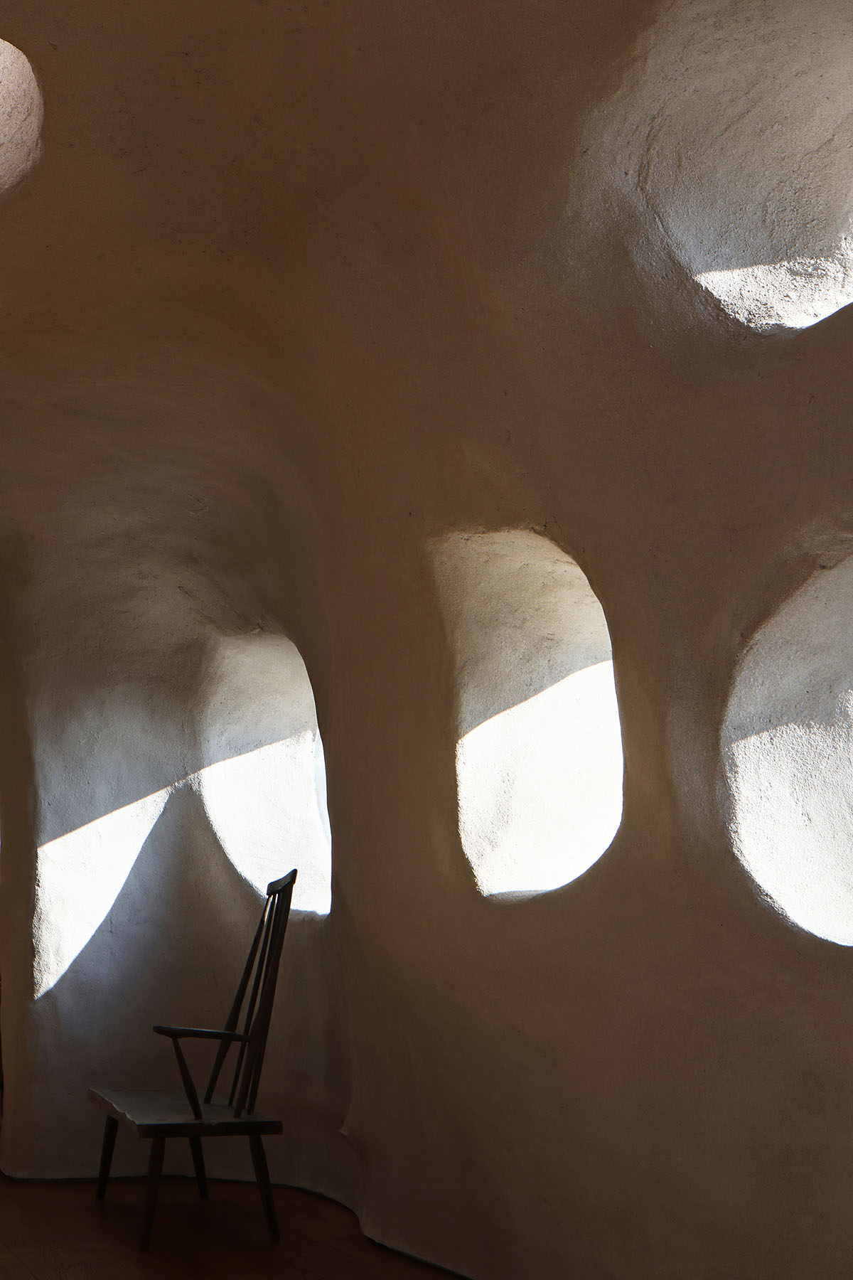 Pilates studio by Wanmu Shazi creates cave-like experience with amorphous interiors in Xiamen