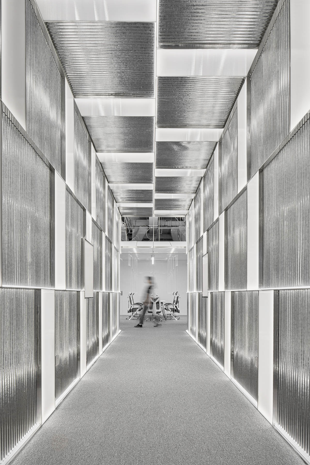 AtelierTree wraps Cyber White Garden Office with white-washed and sharp-cut elements in Beijing