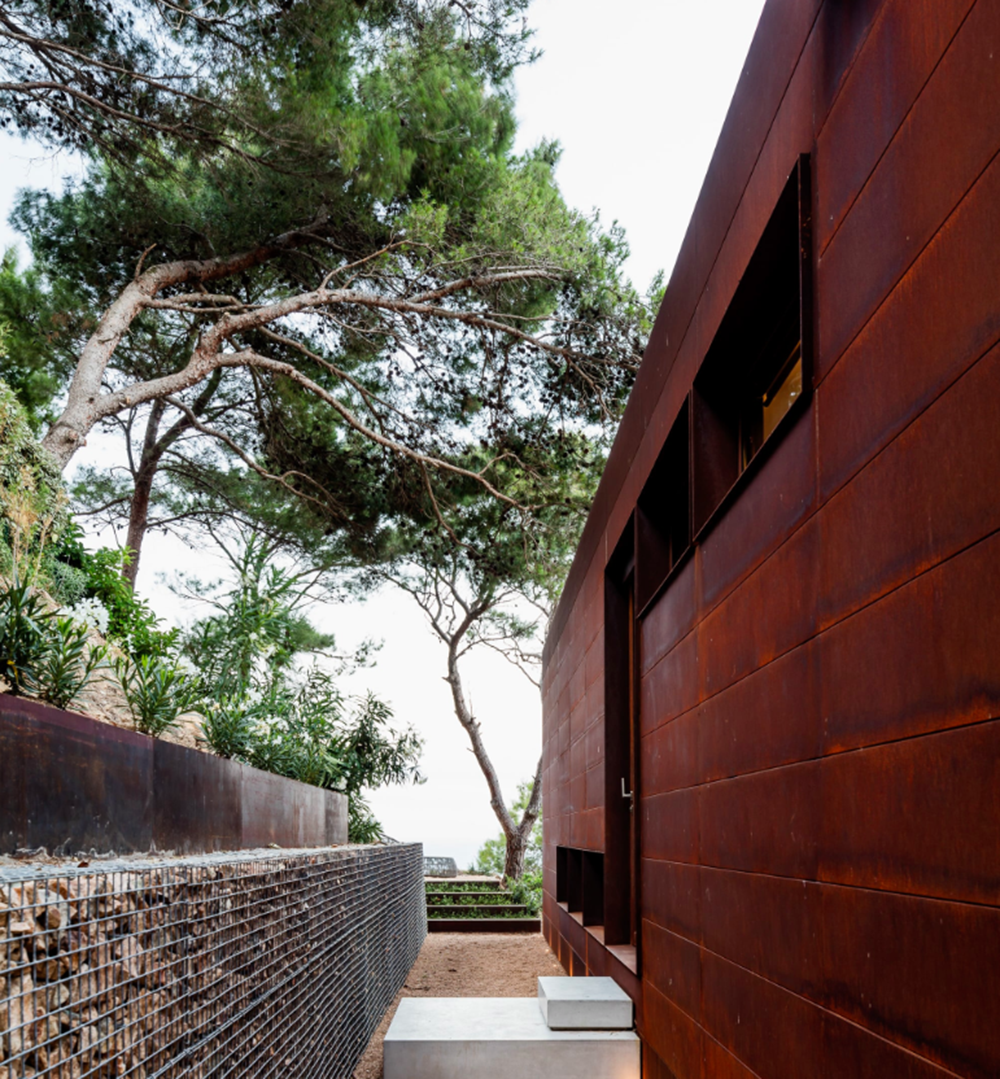 This Is Arquitectura completes corten steel Guest Pavilion in the middle of forest in Spain