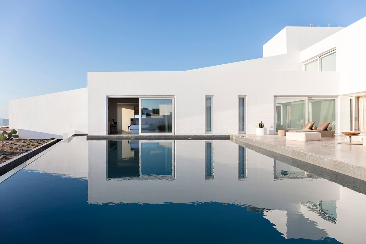 Kapsimalis Architects adds this summer villa featuring orthogonal lines to the Santorini Island