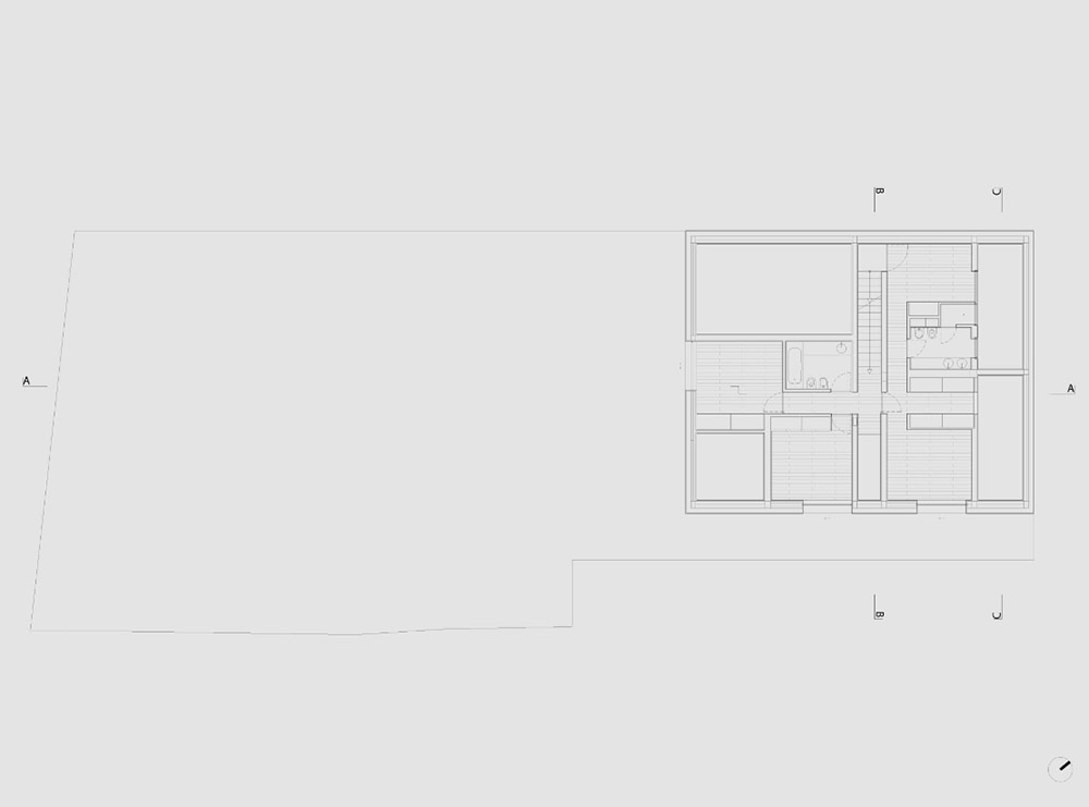 Extrastudio converted former winery in Portugal  into a new family home with red mortar walls