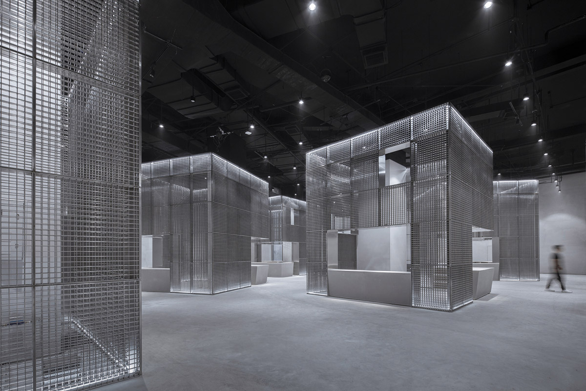 BANDe Architects combines greyscale interior with gridded wooden structures for GreenMonster Lab
