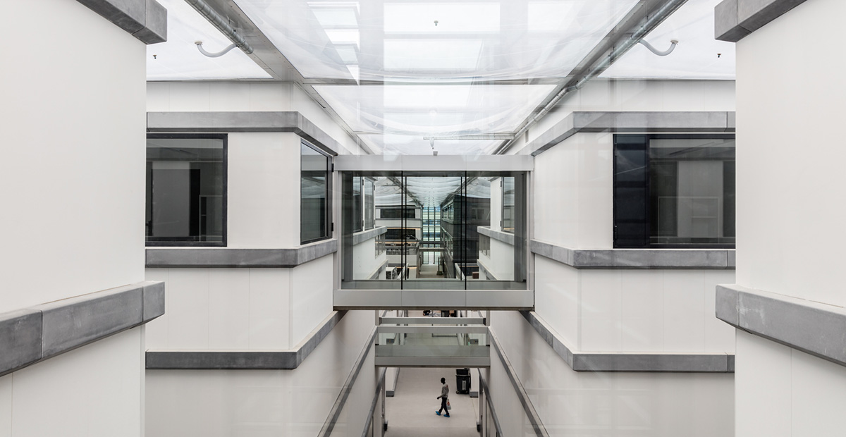 OMA completes its first scientific building for Ecole Centrale Paris inspired by city’s urban grid
