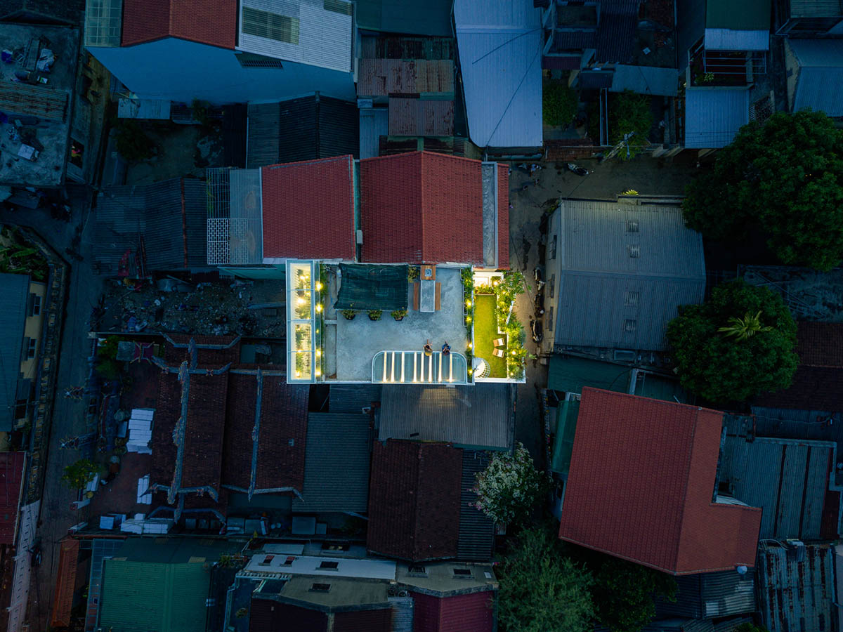 Jalousie House in Vietnam features porous wall with folding pattern for airy interior