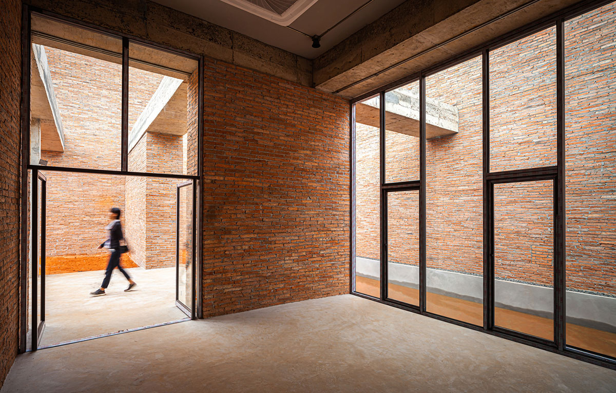 Bangkok Project Studio used over 480,0000 fired clay bricks to form elephant museum with curved walls