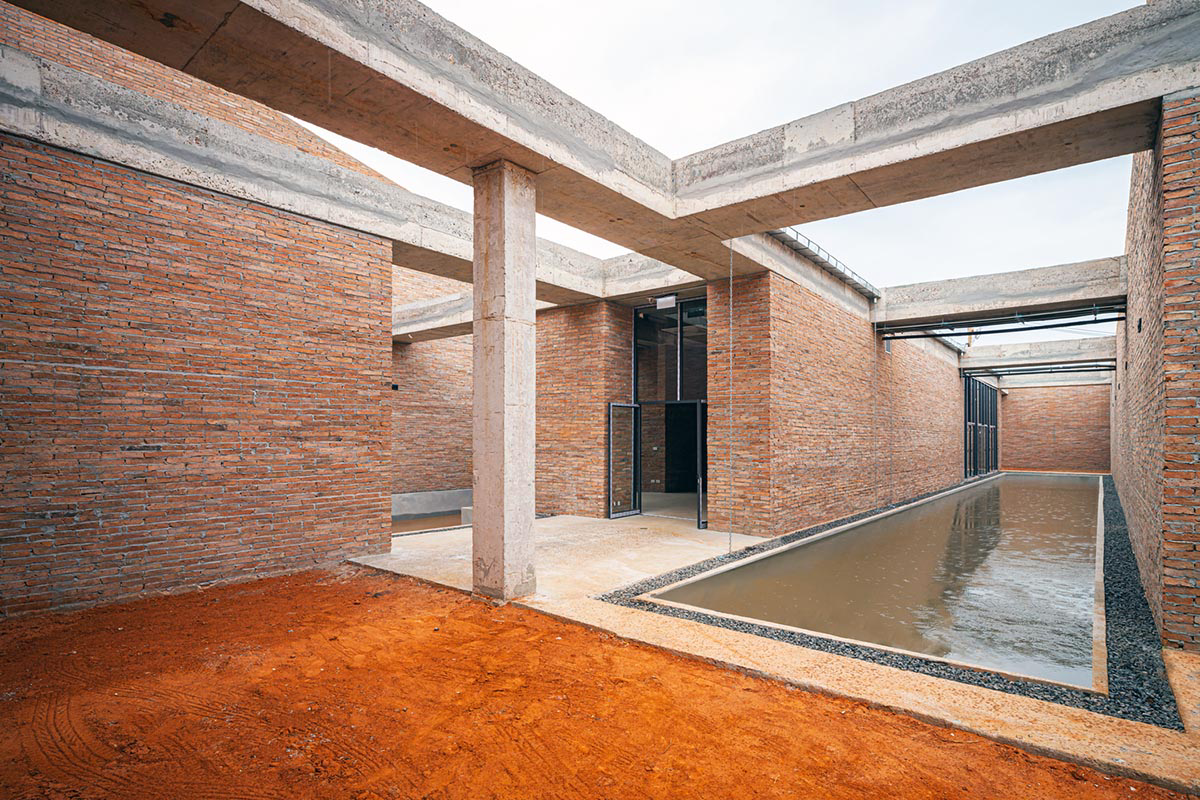 Bangkok Project Studio used over 480,0000 fired clay bricks to form elephant museum with curved walls