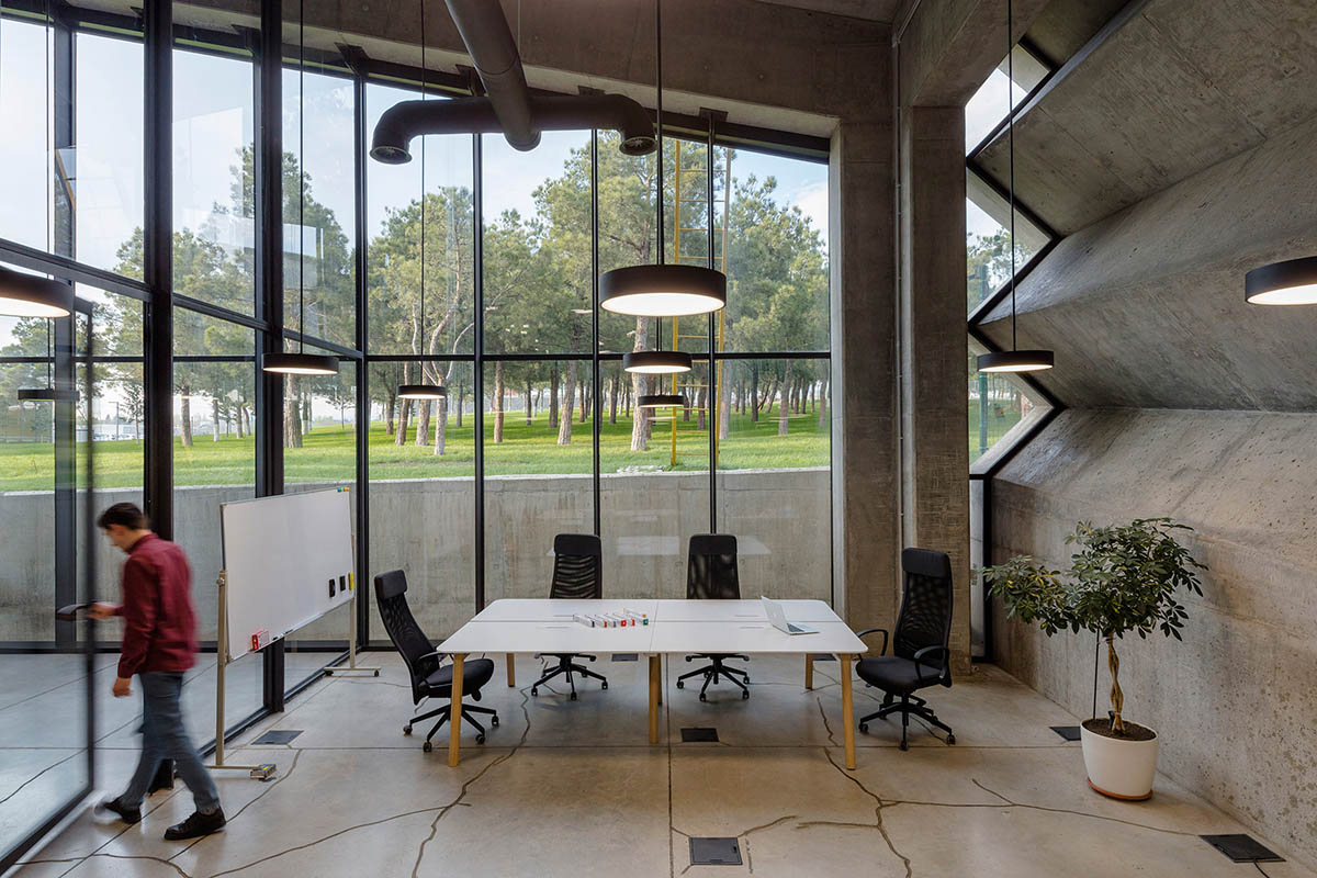 Folded concrete shell wraps coffee production plant by Giorgi Khmaladze Architects in Tbilisi