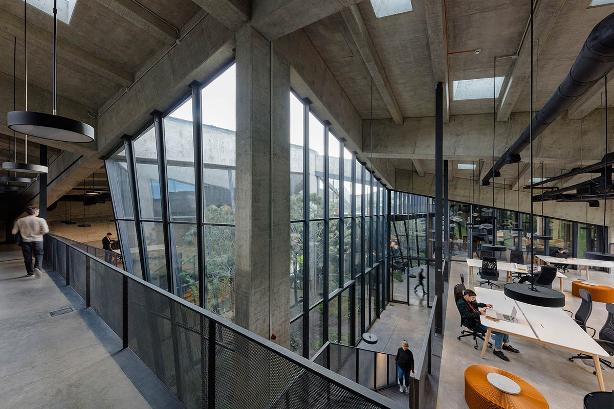 Folded concrete shell wraps coffee production plant by Giorgi Khmaladze Architects in Tbilisi