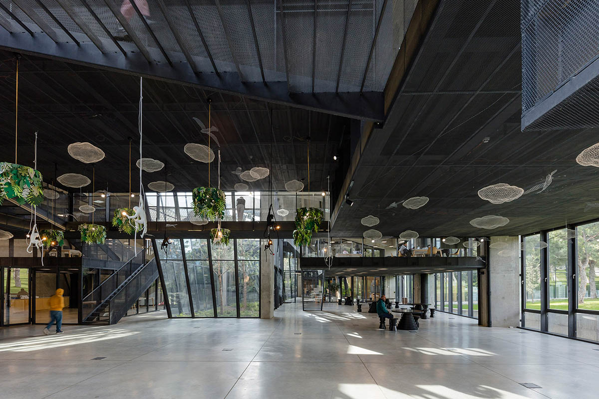 Folded concrete shell wraps coffee production plant by Giorgi Khmaladze Architects in Tbilisi