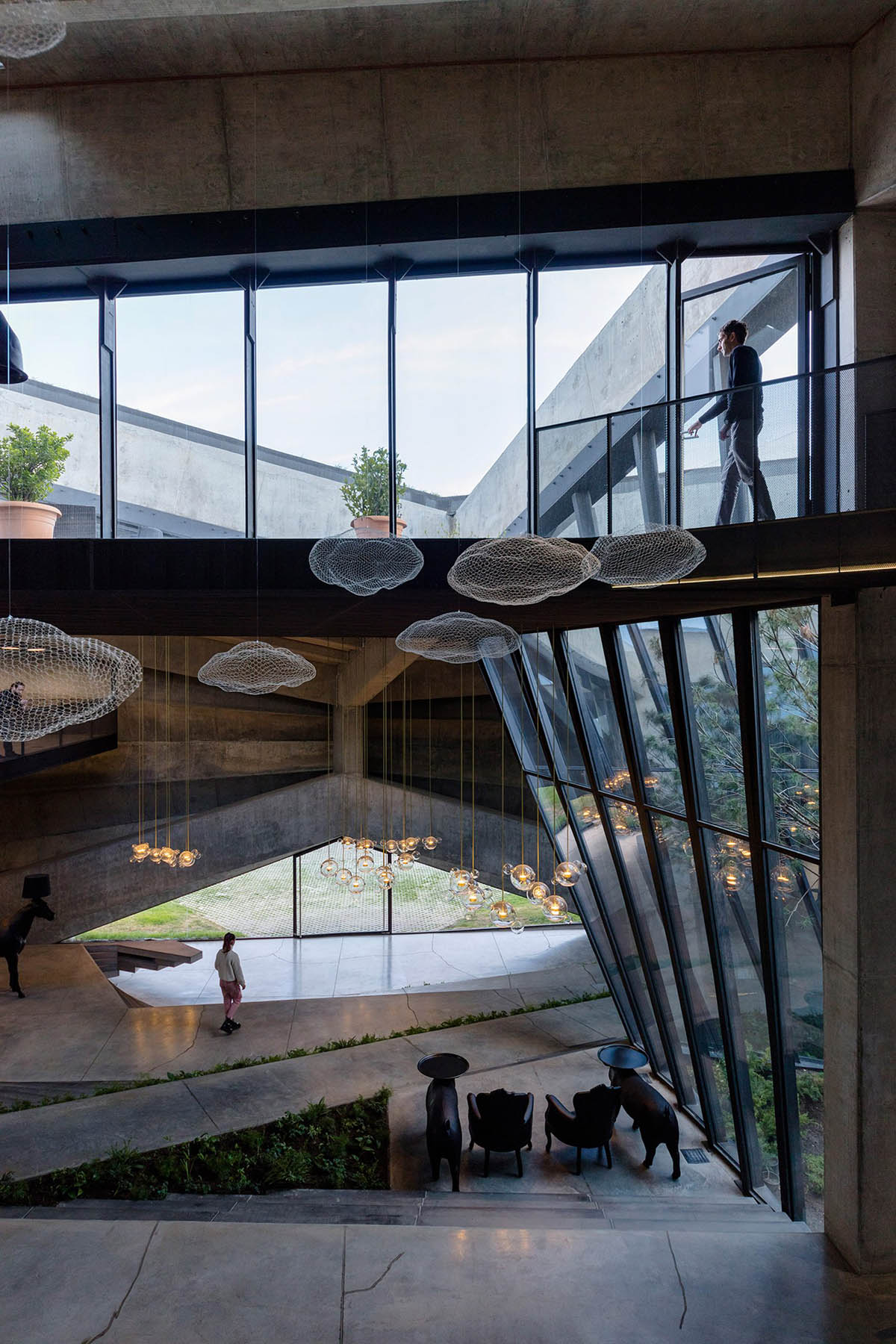 Folded concrete shell wraps coffee production plant by Giorgi Khmaladze Architects in Tbilisi