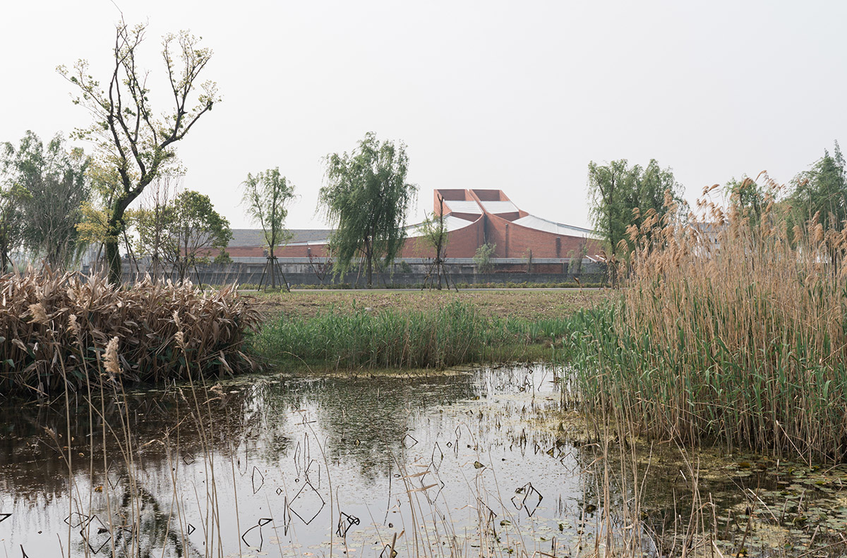 Roarc Renew repurposes old granaries as an art centre with flowing brick corridors in Jiaxing, China