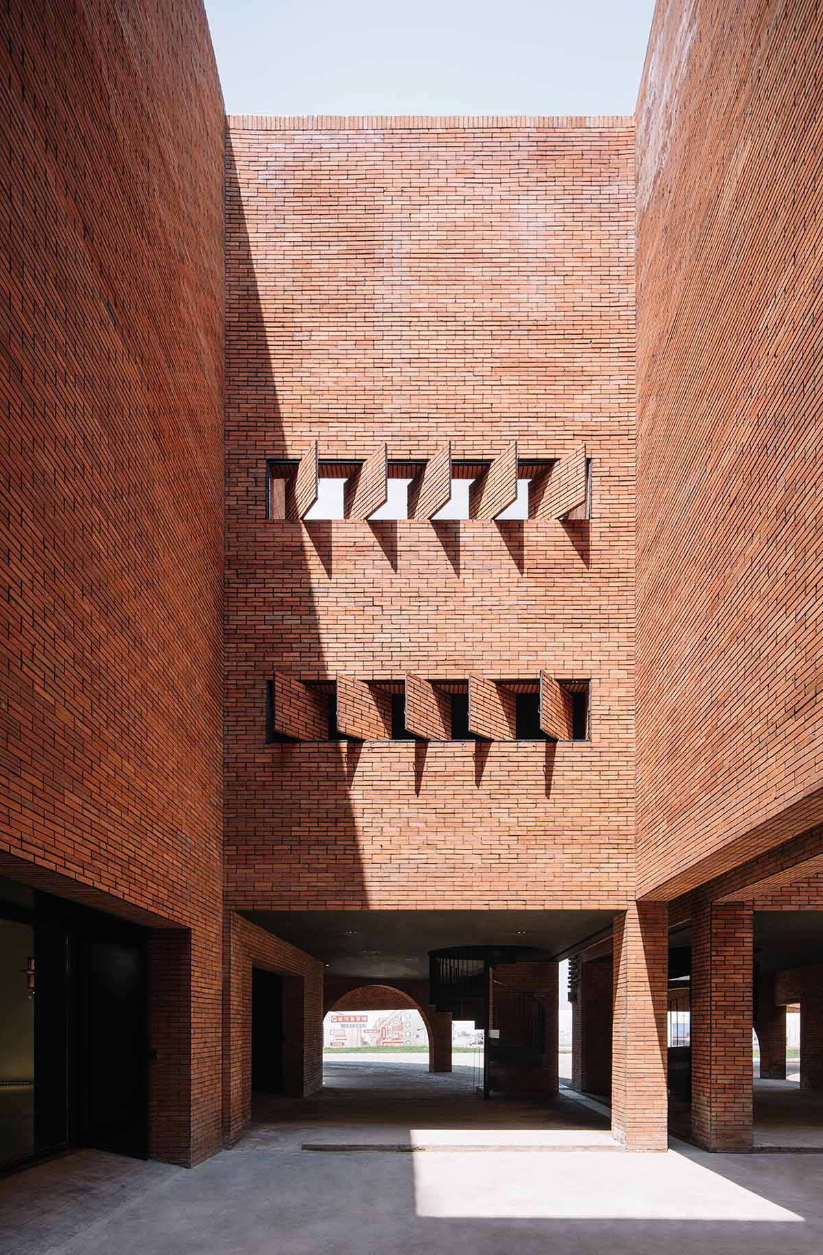 Roarc Renew repurposes old granaries as an art centre with flowing brick corridors in Jiaxing, China