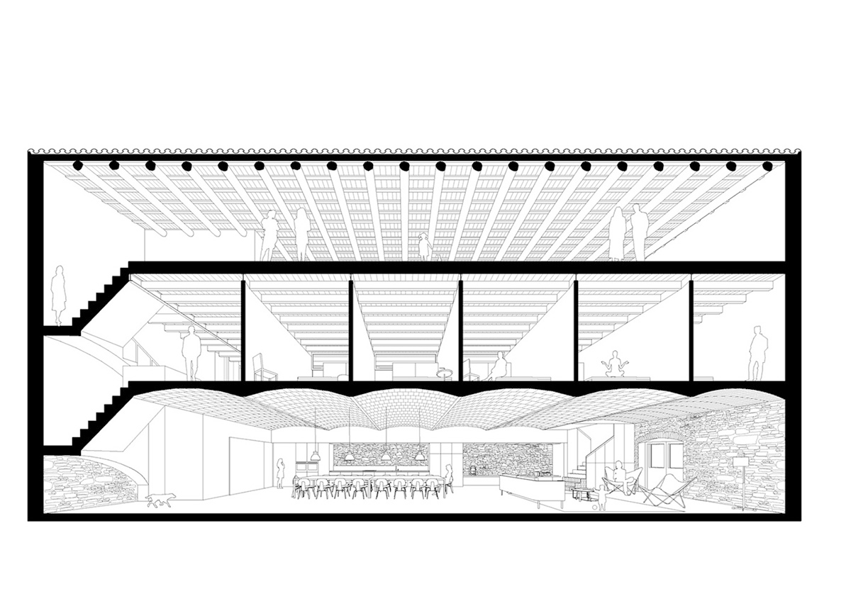 Anna & Eugeni Bach converts former chocolate factory into residence with stone walls in Spain