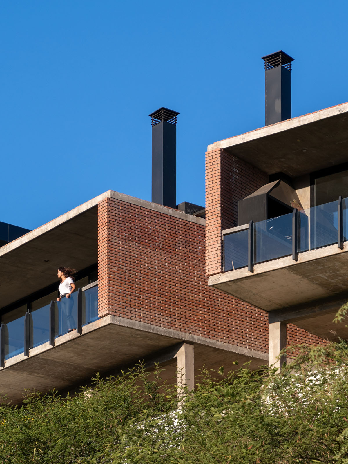 Cabanillas Gonzalo completes twin houses on a hilly landscape in Cordoba