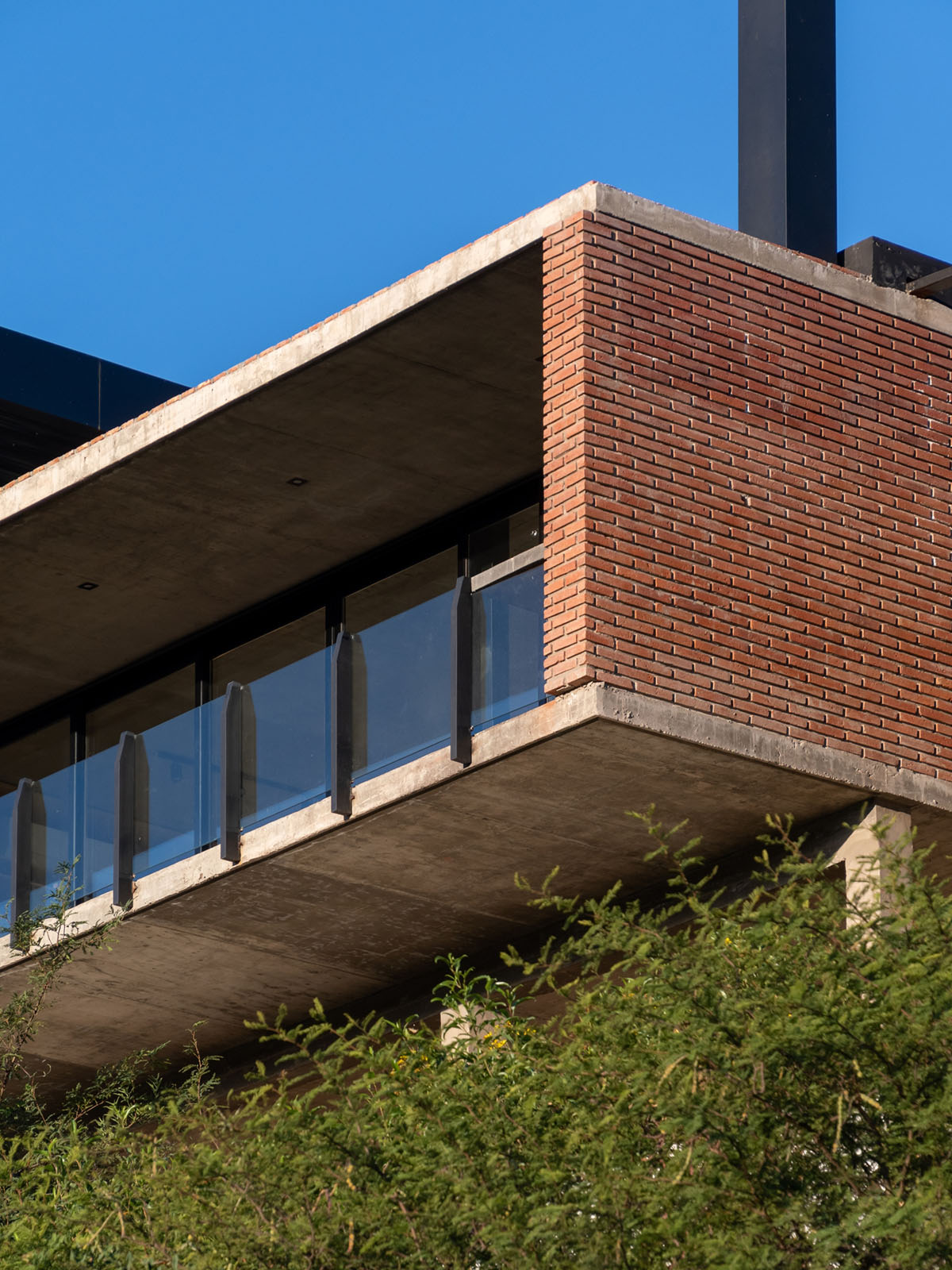 Cabanillas Gonzalo completes twin houses on a hilly landscape in Cordoba