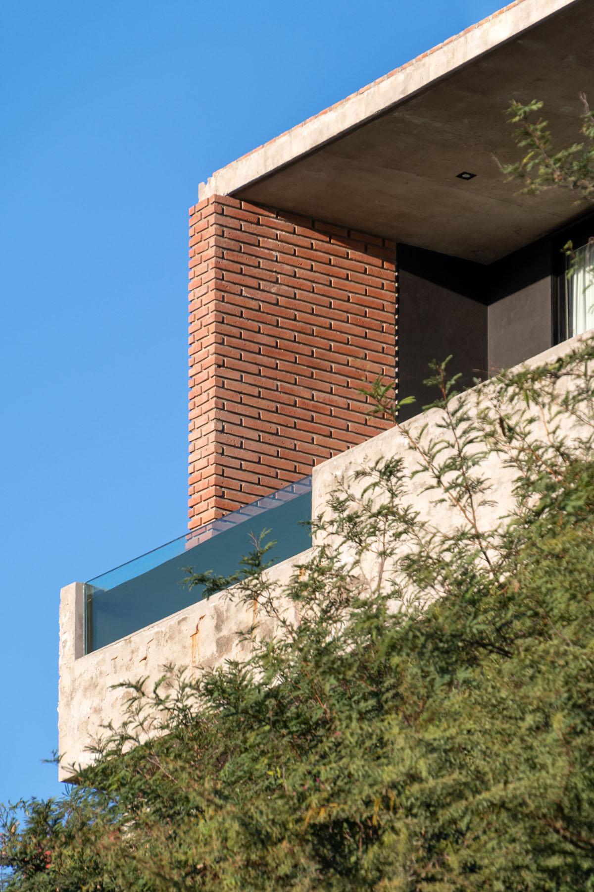 Cabanillas Gonzalo completes twin houses on a hilly landscape in Cordoba