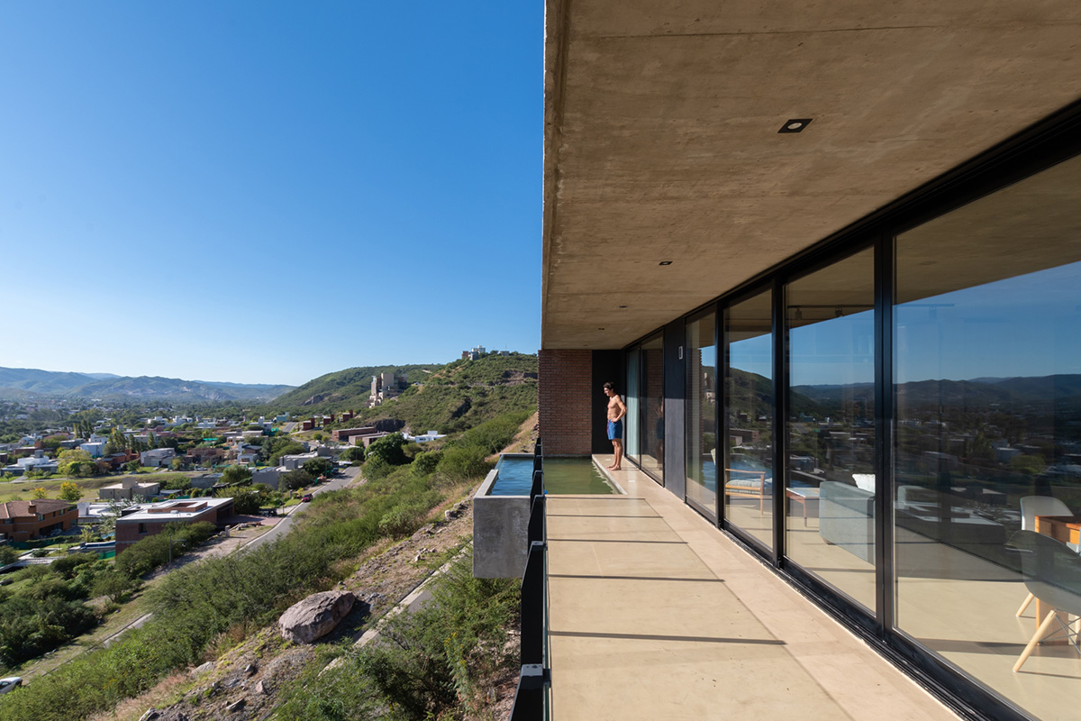 Cabanillas Gonzalo completes twin houses on a hilly landscape in Cordoba