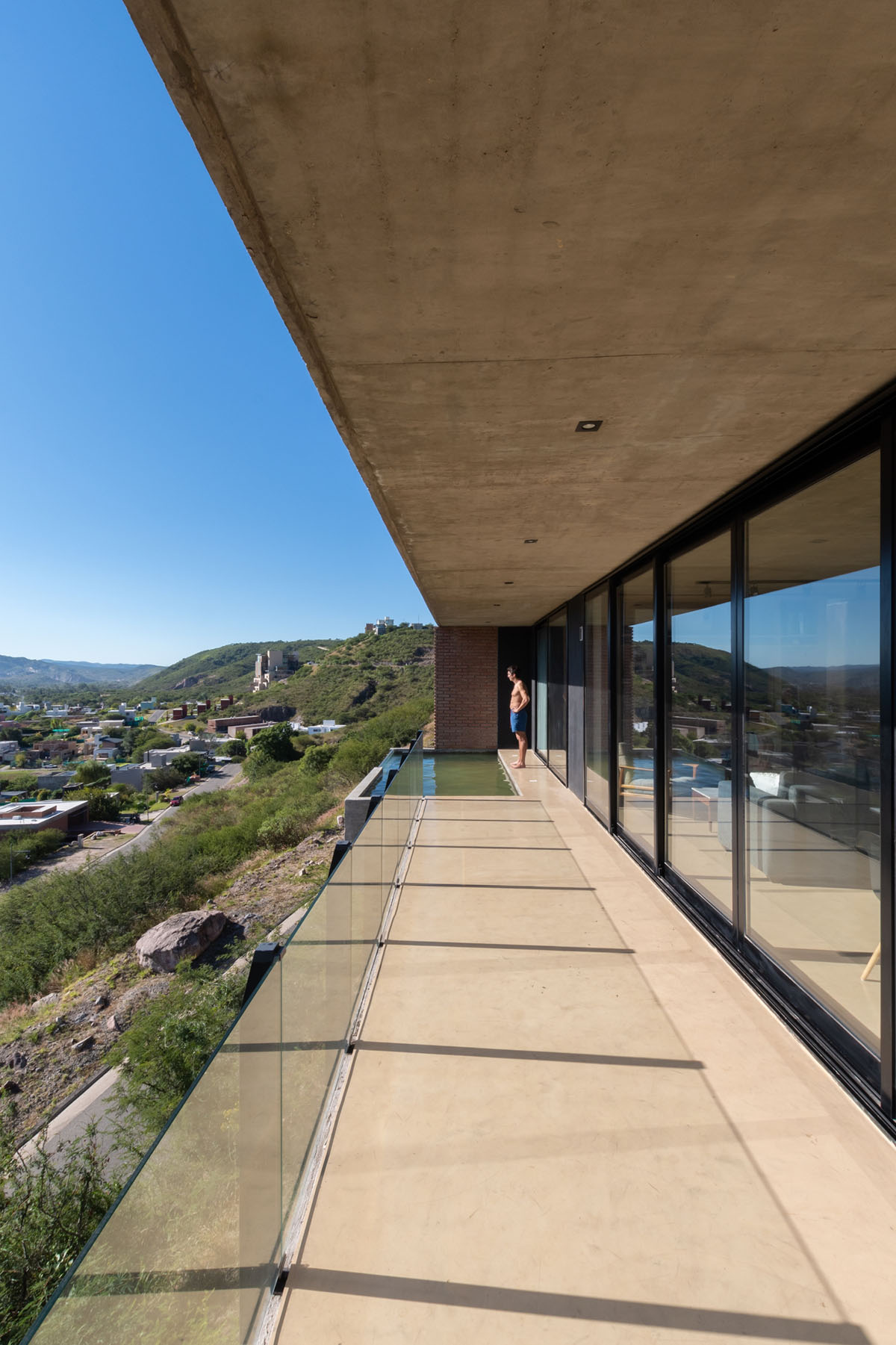 Cabanillas Gonzalo completes twin houses on a hilly landscape in Cordoba