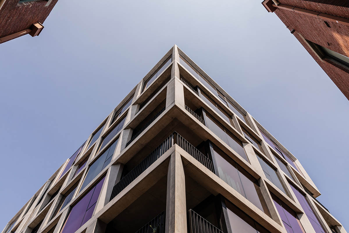 Piccolo House by Wood Marsh features coloured reflective glass elements in South Melbourne