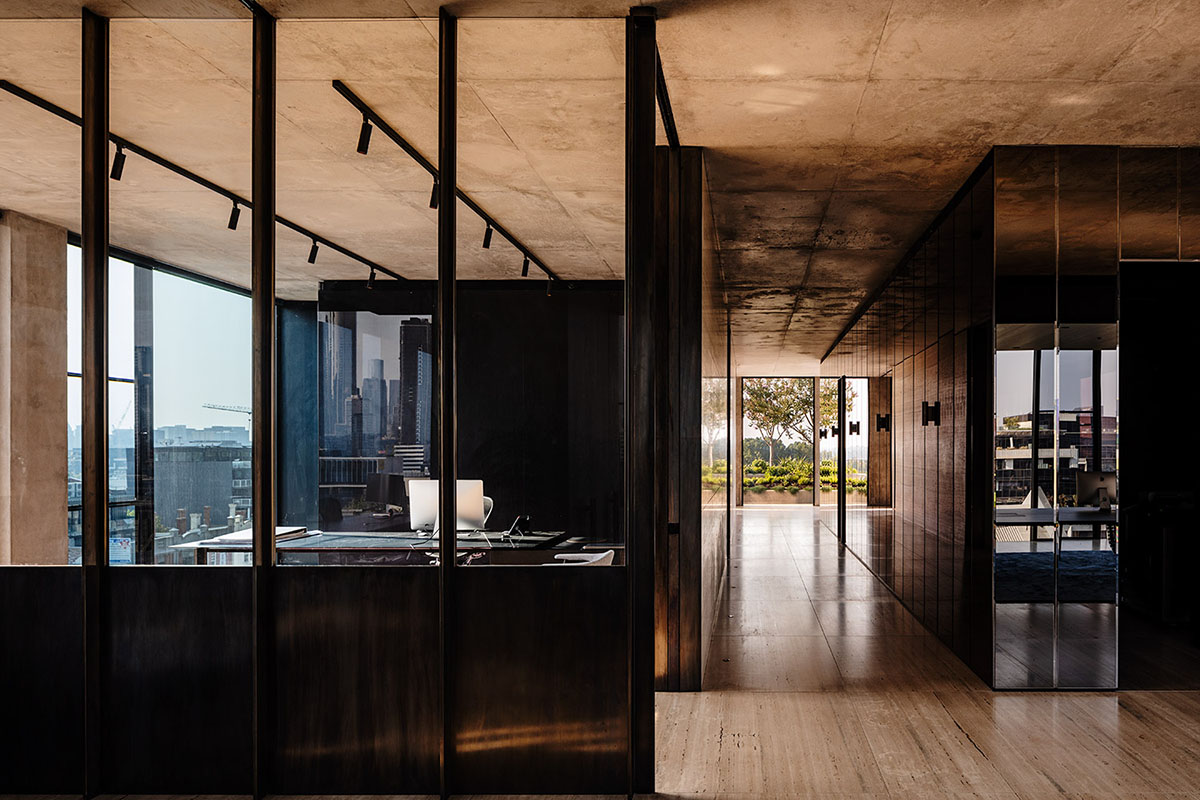 Piccolo House by Wood Marsh features coloured reflective glass elements in South Melbourne