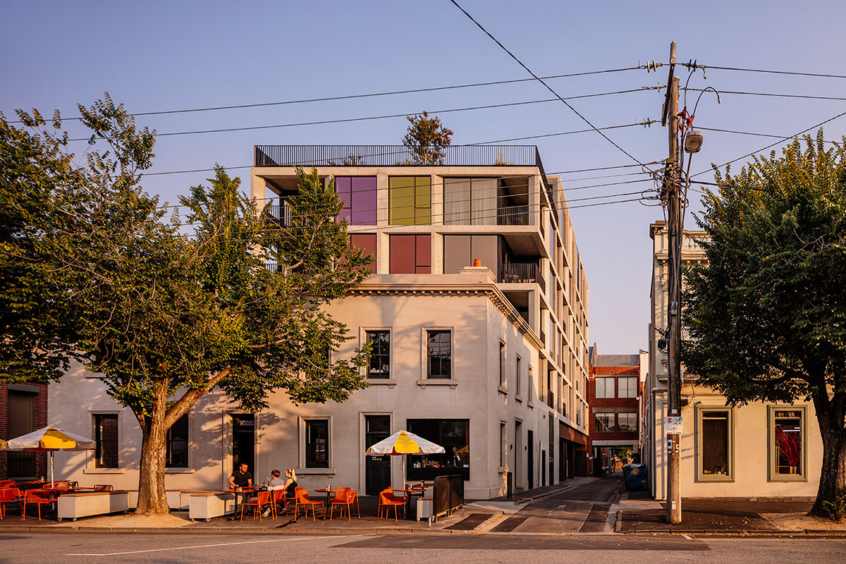 Piccolo House by Wood Marsh features coloured reflective glass elements in South Melbourne