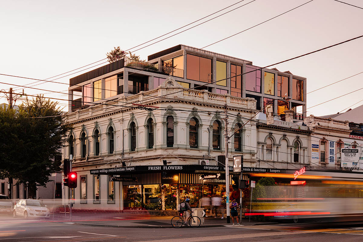 Piccolo House by Wood Marsh features coloured reflective glass elements in South Melbourne
