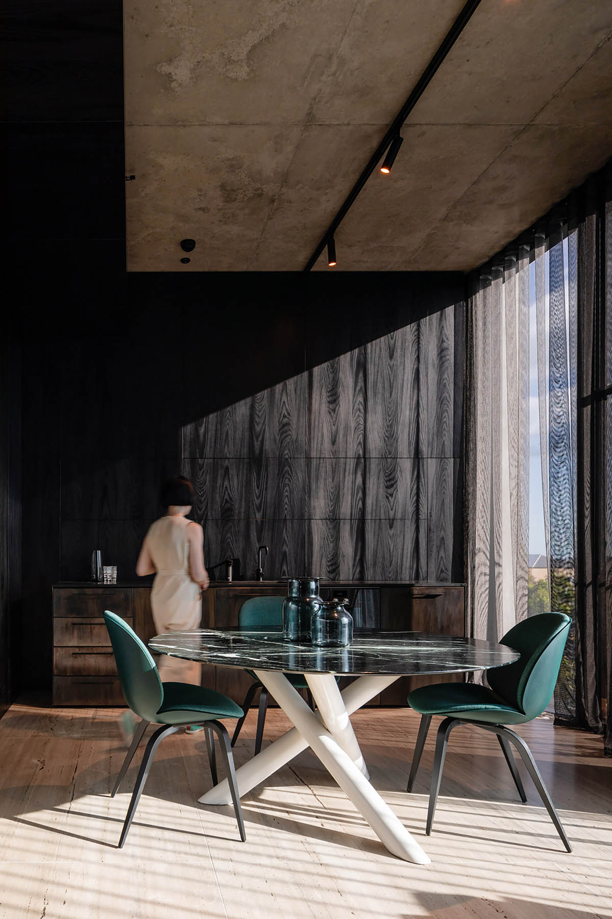 Piccolo House by Wood Marsh features coloured reflective glass elements in South Melbourne