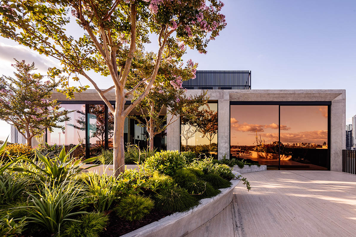 Piccolo House by Wood Marsh features coloured reflective glass elements in South Melbourne