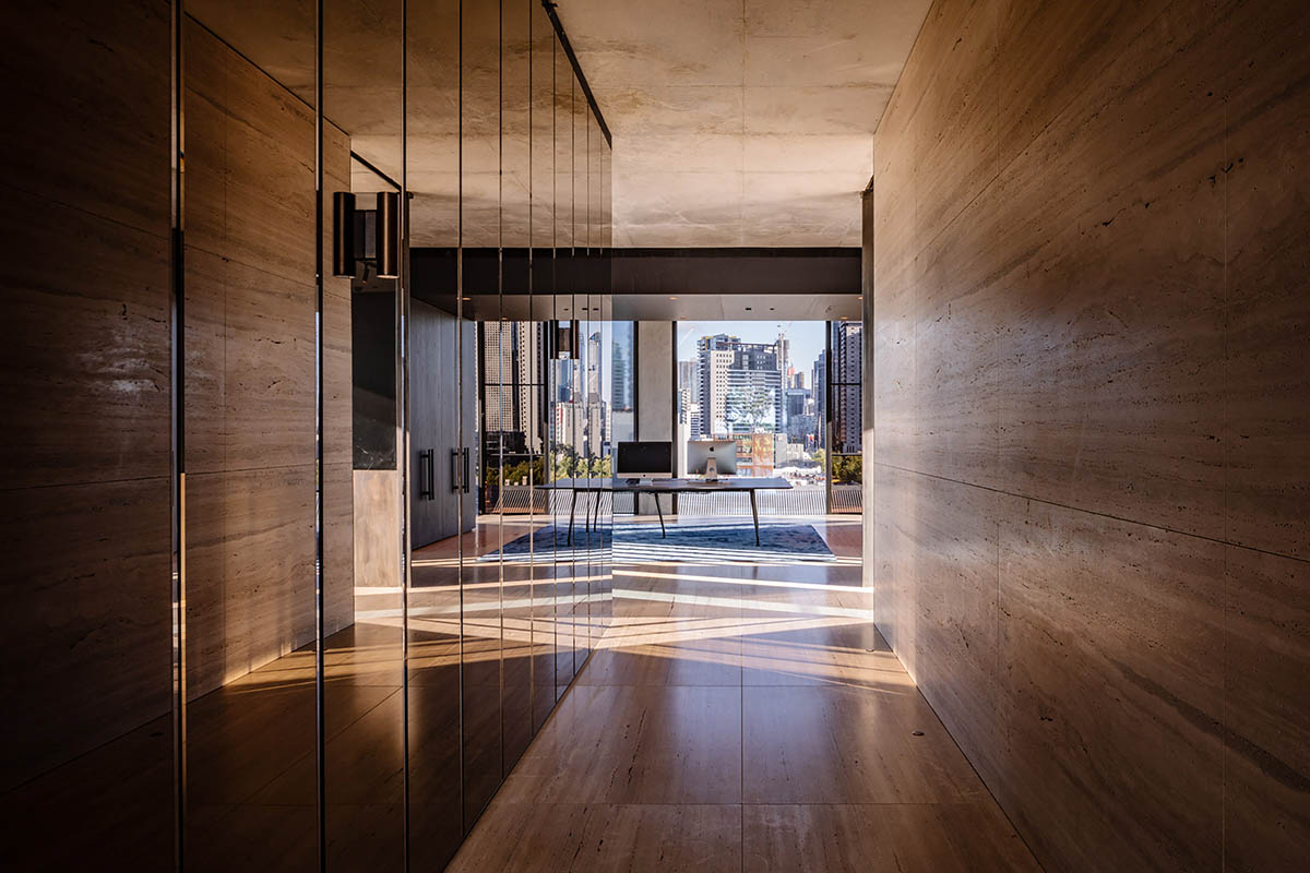 Piccolo House by Wood Marsh features coloured reflective glass elements in South Melbourne